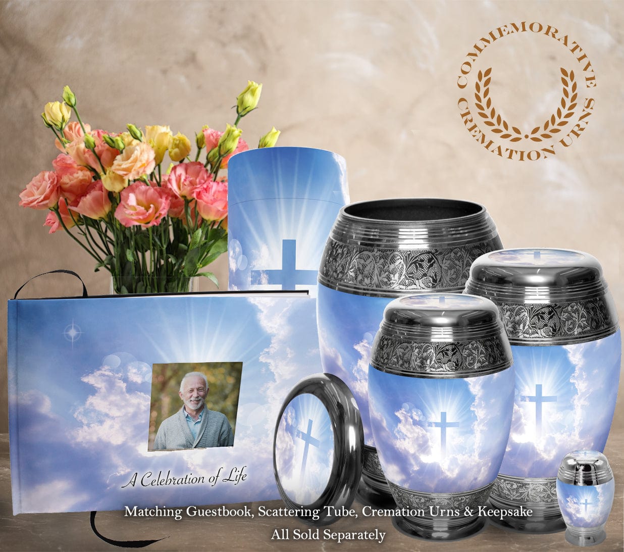 Set of blue cremation urns with cross and clouds design, guestbook, and flowers