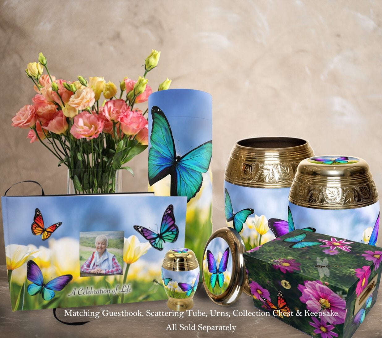 Colorful butterfly cremation urns and keepsakes with flower designs, displayed with fresh flowers.